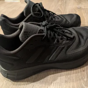Adidas Black Athletic Shoes with Textured Upper
