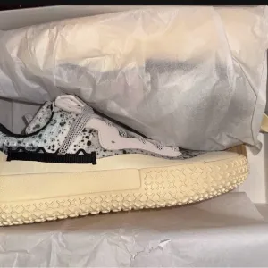 Black and Cream Athletic Shoes with Textured Sole