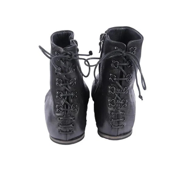 Black Ankle boots in vintage leather by Ink