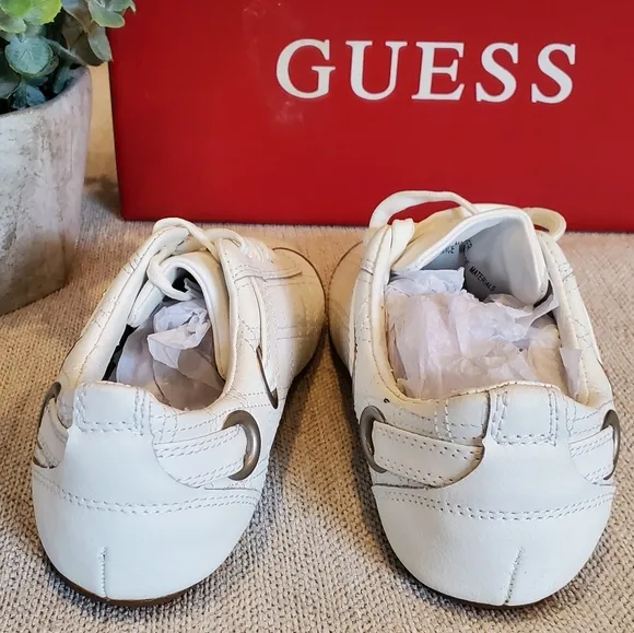 Brand new Guess sneakers size 5