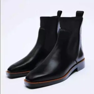 (C) Zara Flat leather ankle boots with elastic at the ankle, size 39/8 US