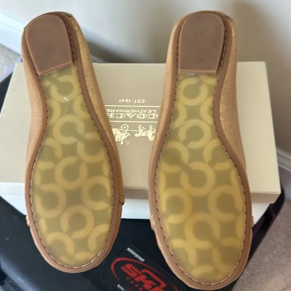 Coach Gold leather flats
