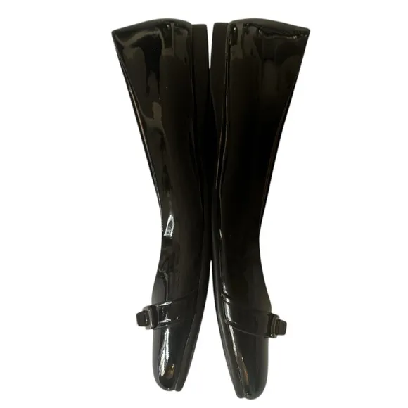 COACH Oswald Black Patent Leather Ballerina Flats with Metal Buckle Accent.