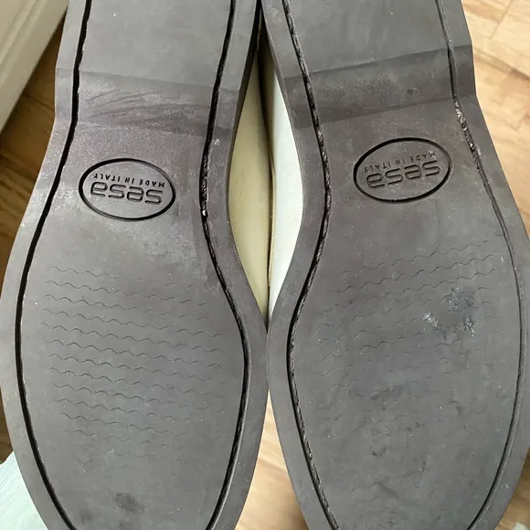 Cream and Brown Moccasins with Visible Stitching and Slip-On Design