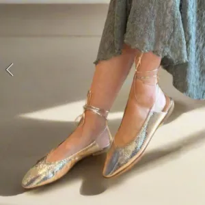 Elegant snakeskin lace up flats