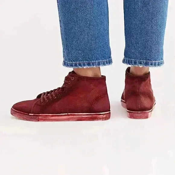 Free People River Run Distress look sneakers.