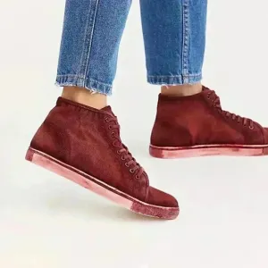 Free People River Run Distress look sneakers.