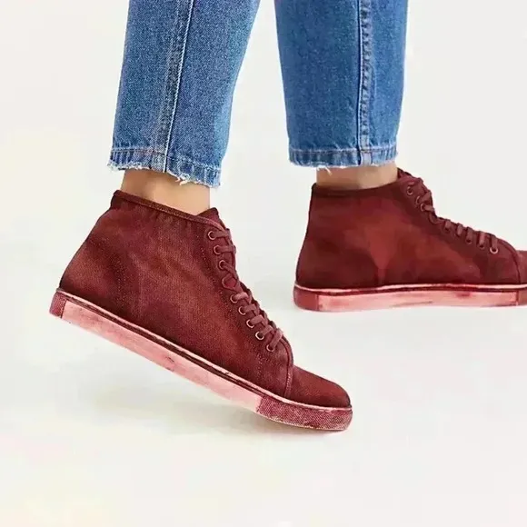 Free People River Run Distress look sneakers.