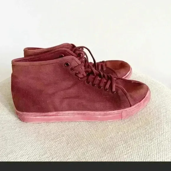 Free People River Run Distress look sneakers.