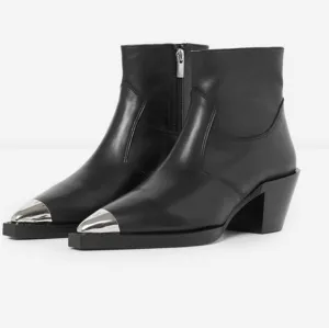 Heeled western- and rock-style boots