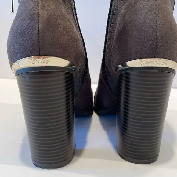 Juicy couture heeled boots in a size 8 medium with approximately a 4 inch heel