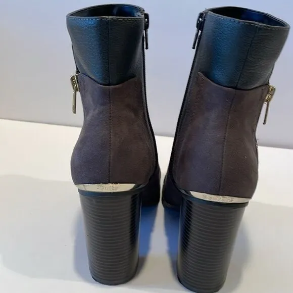 Juicy couture heeled boots in a size 8 medium with approximately a 4 inch heel