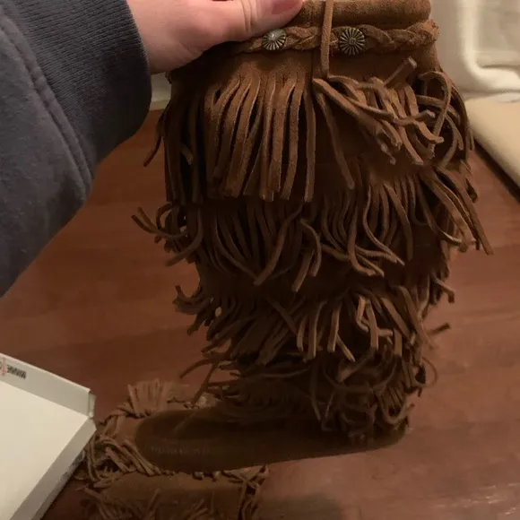 Minnetonka high fringe boots