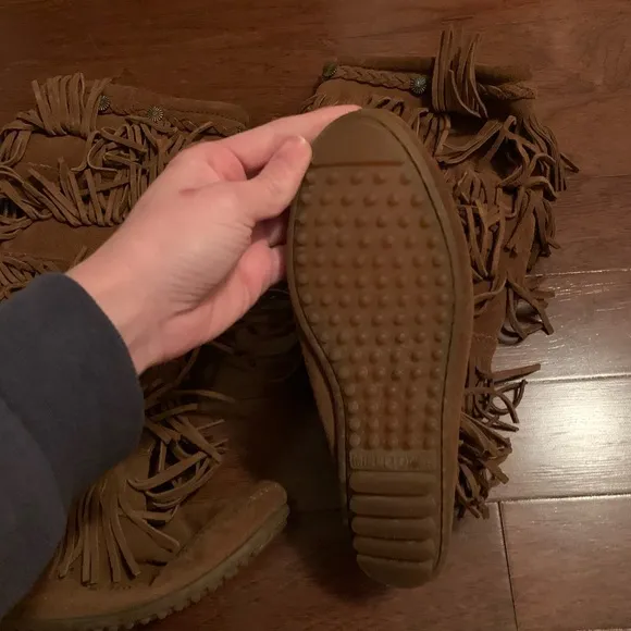 Minnetonka high fringe boots