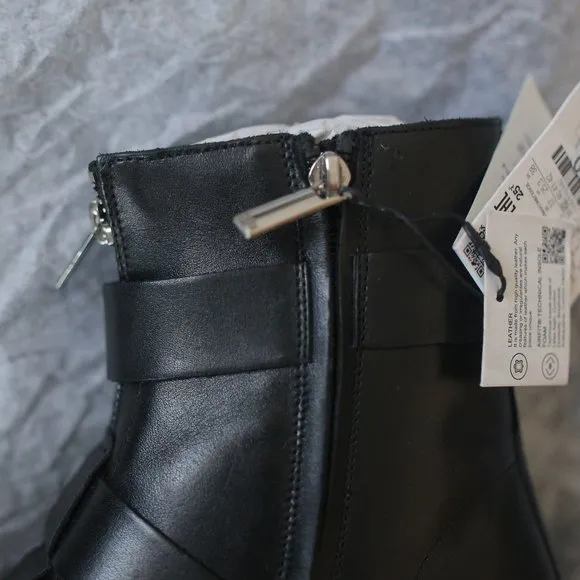 NWT BLACK LOW HEELED GENUINE LEATHER ANKLE BOOTS WITH BUCKLES.