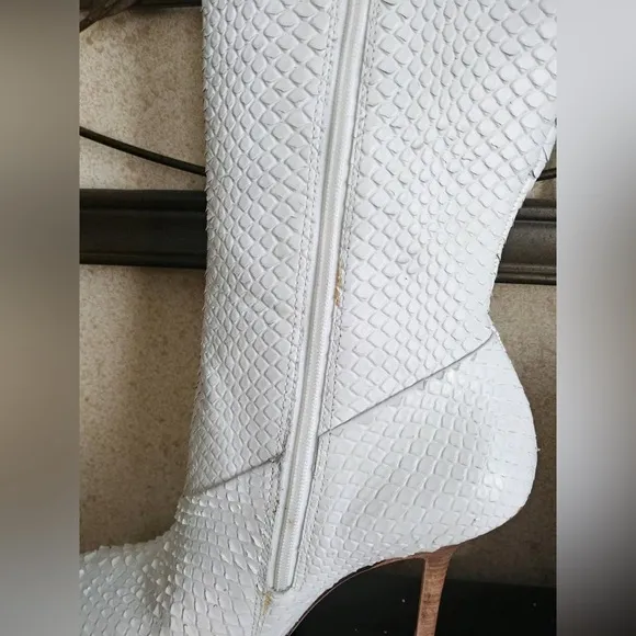 Report Signature white leather heeled boots in size 8. Made in Brazil.