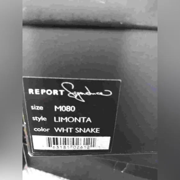 Report Signature white leather heeled boots in size 8. Made in Brazil.