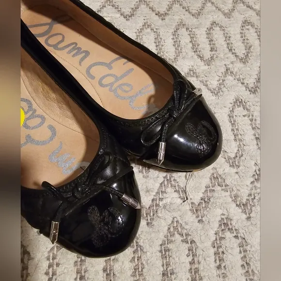 SAM EDELMAN quilted black leather flats with lace bow. Used size 5