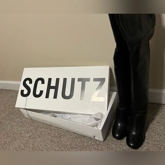 Schutz leather boots. Size 7.  Brand new in box.