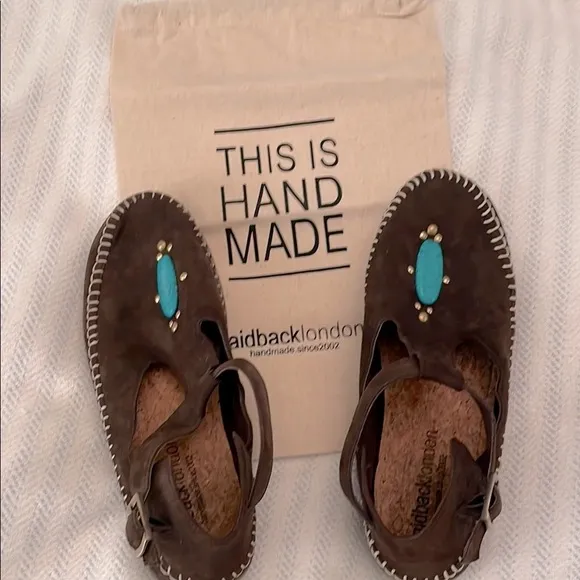 Sundance   Laidback London suede, whipstiched, moccasins w/ turquoise accents.