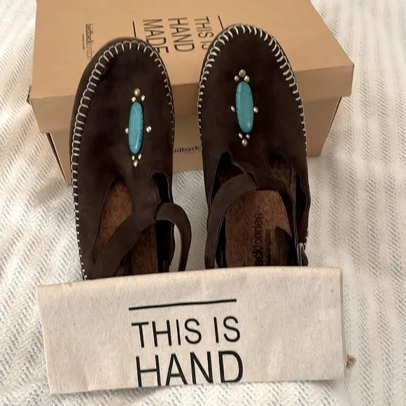 Sundance   Laidback London suede, whipstiched, moccasins w/ turquoise accents.
