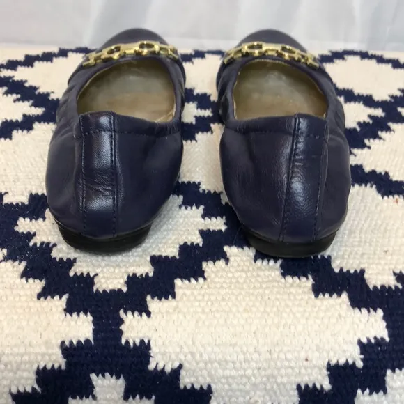 Tahari navy leather flats with gold buckle detail