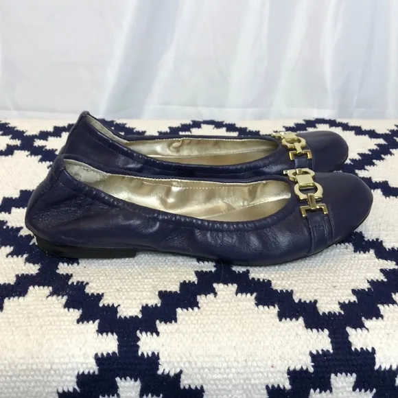 Tahari navy leather flats with gold buckle detail