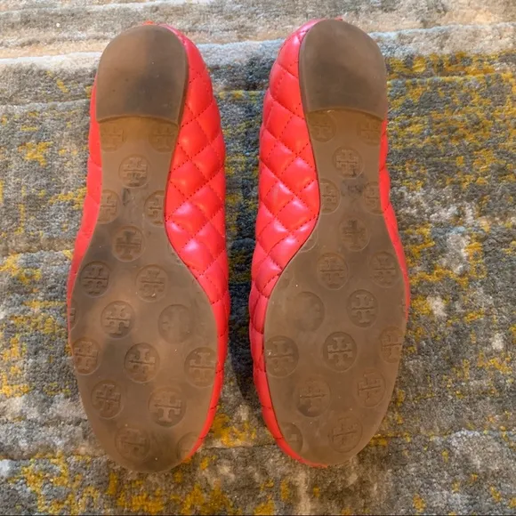Tory Burch quilted leather flats in burnt orange