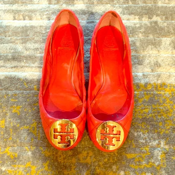 Tory Burch quilted leather flats in burnt orange