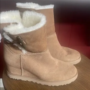 UGG tan and white wedge boots