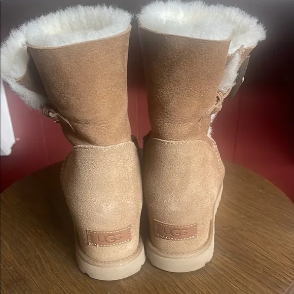 UGG tan and white wedge boots
