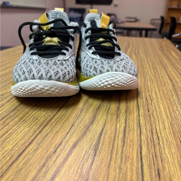 Under Armour Corry Young Wolf Gray and Gold Athletic Shoes