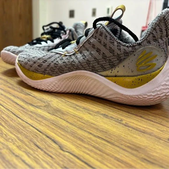 Under Armour Corry Young Wolf Gray and Gold Athletic Shoes