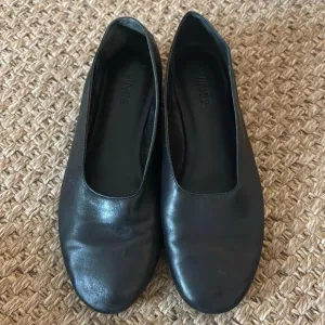 Vince black leather flats, size 6M.