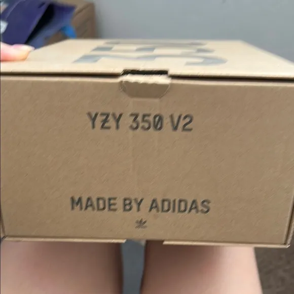 Yeezy White Knit Athletic Shoes with Streamlined Silhouette